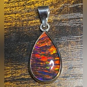 SOLD! Elegant 20 Carat Fire Opal set in 925 Sterling Silver Pendant